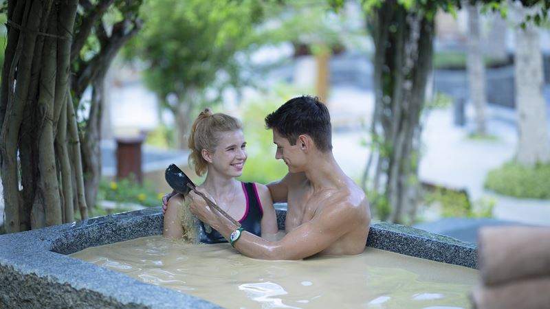 s soaking in hot mud tub cr