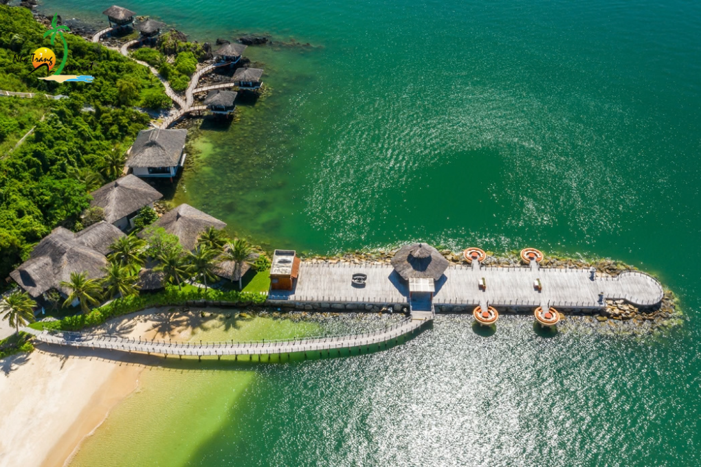 Aerial view of Vinpearl Luxury Nha Trang, showcasing its waterfront accommodation, private jetty and tropical island setting
