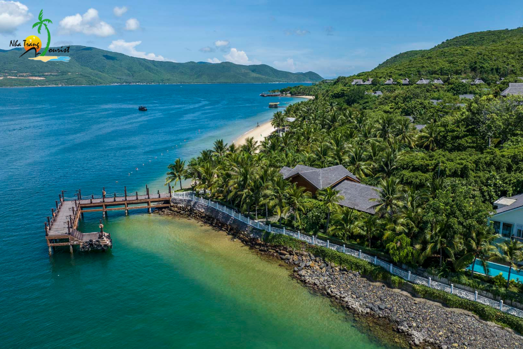 Hon Tam Resort offers a tropical island setting with lush greenery, turquoise water and coastal scenery