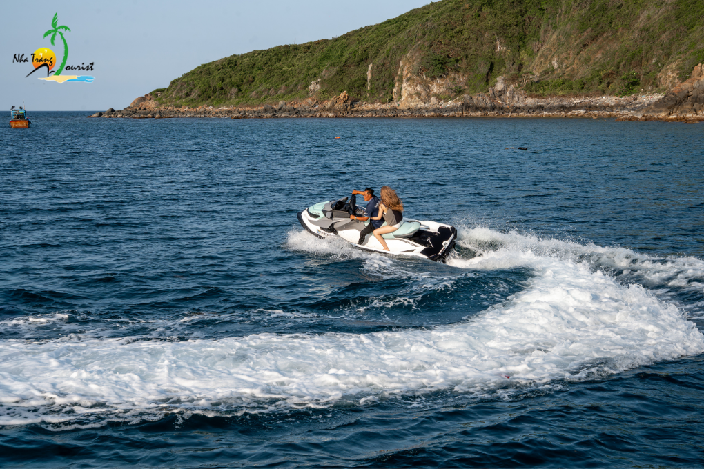 Add an active water sports experience to your Nha Trang yacht trip with a ride across the sea on a personal watercraft, subject to availability and sea conditions